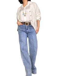 Jeans bleu clair , jambe droite avec sur picure le long de la jambe