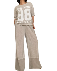 Pantalon beige délavé taille élastique, avec garniture en filet au bas