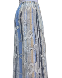 Pantalon palazzo rayé bleu marin, beige, bleu ciel et blanc avec des lettres blanches taille élastique