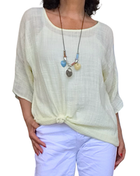 Blouse unie jaune pâle à manches courtes, col rond