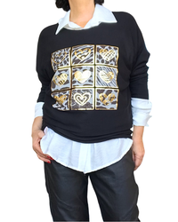 Chandail en tricot uni noir avec dessin de cœurs dorés, manche longue chauve souris